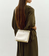 Stowaway Crossbody Smooth Calfskin White Sand with Silver Hardware
